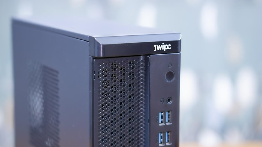 智微智能Green PC GCA01的機(jī)箱采用了金屬塑料分離的設(shè)計.jpg